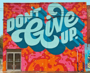 Don't Give Up Mural on Wunderkammer Art Gallery in Fort Wayne